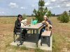 Sarah, with Shaun & Dolly and Liz with Neska, just finishing a lunch-break in France, on their way from S.Spain to the UK.